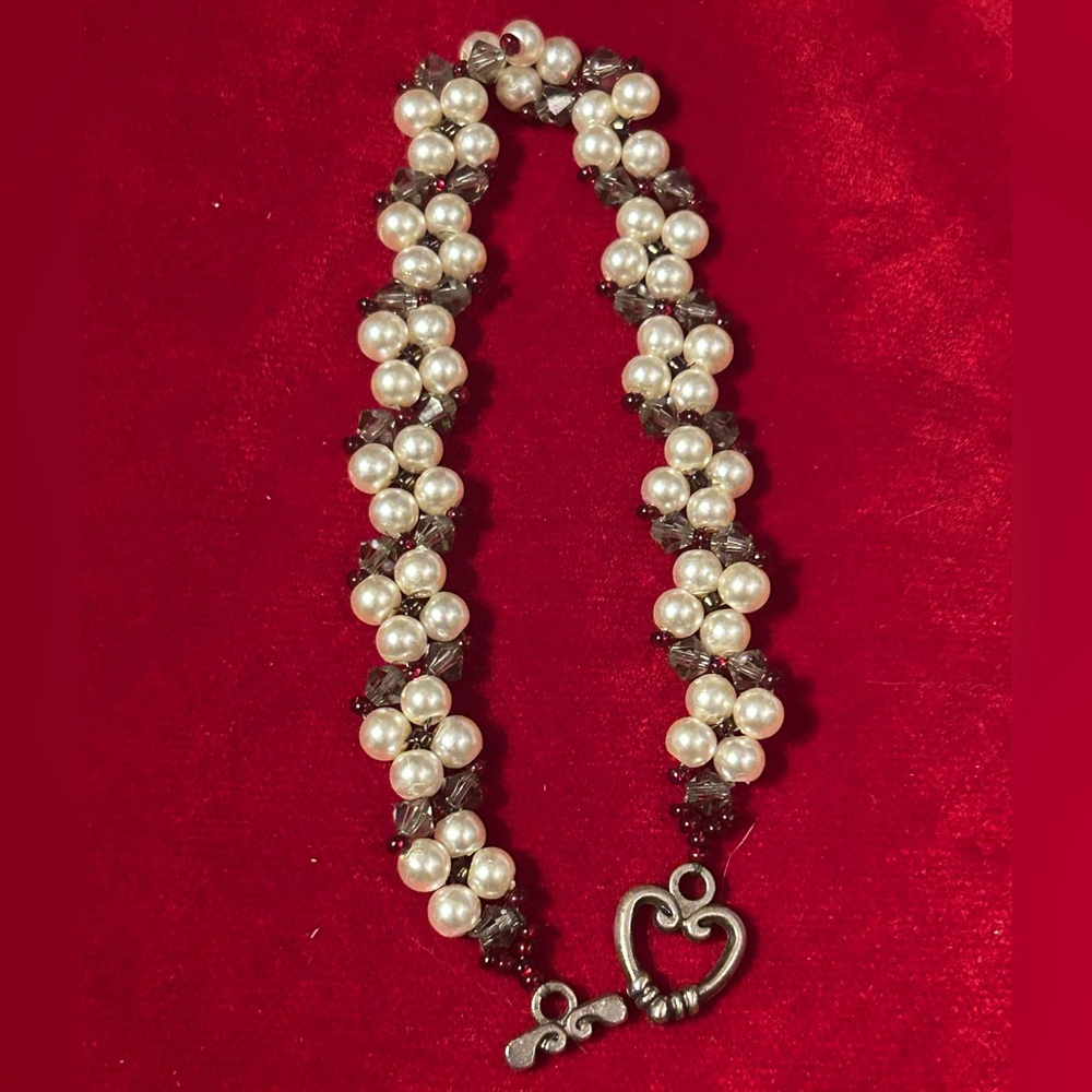 Elegant hand-crafted Pearl and Silver Bracelet with garnet colored accent beads